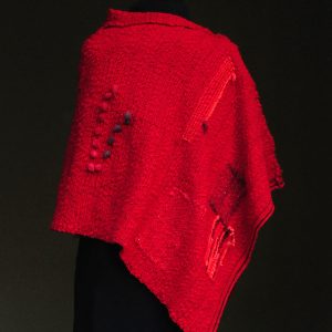 Poncho Rojo.